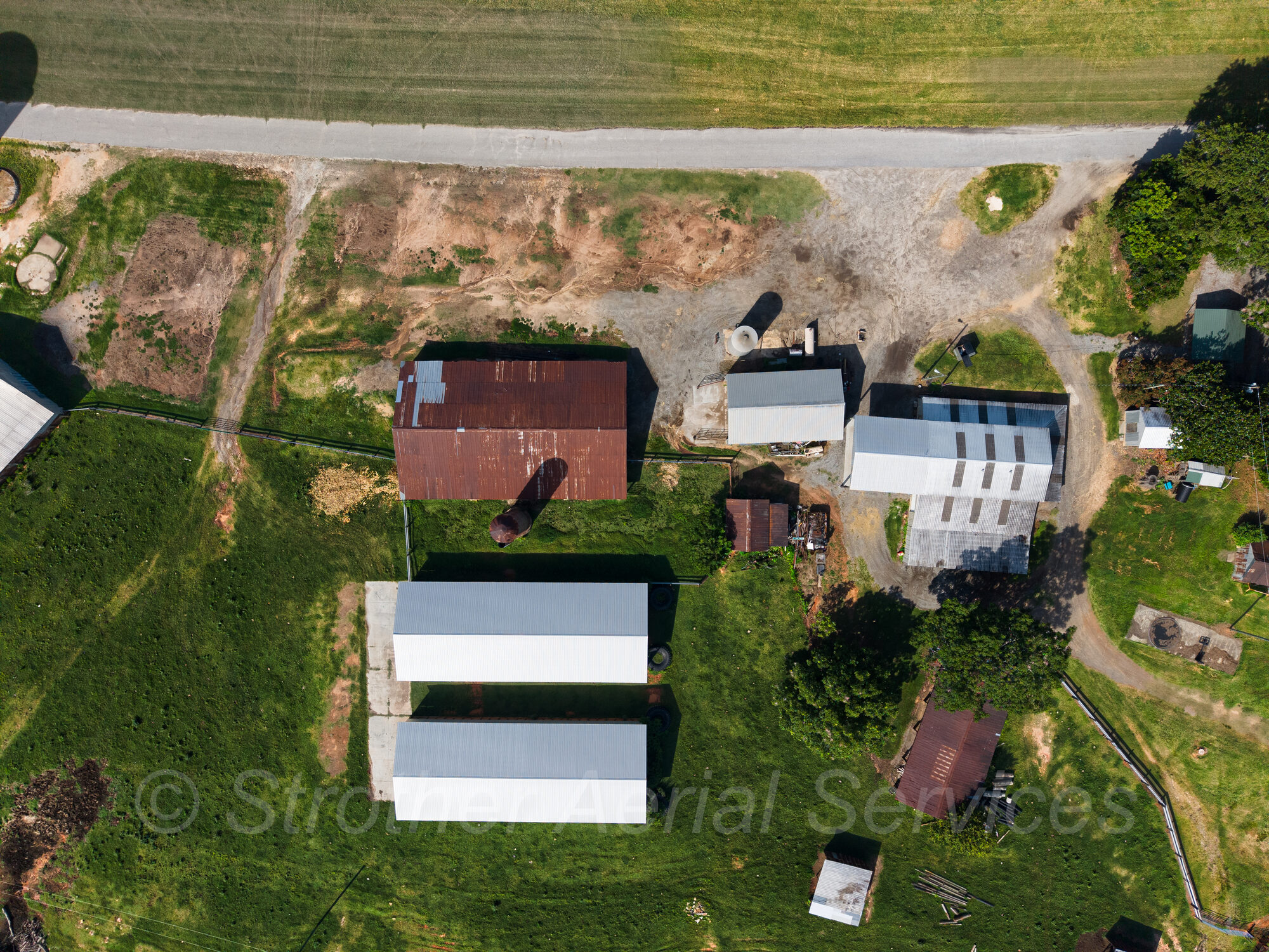 Aerial view of a Piedmont Triad farmhouse and property