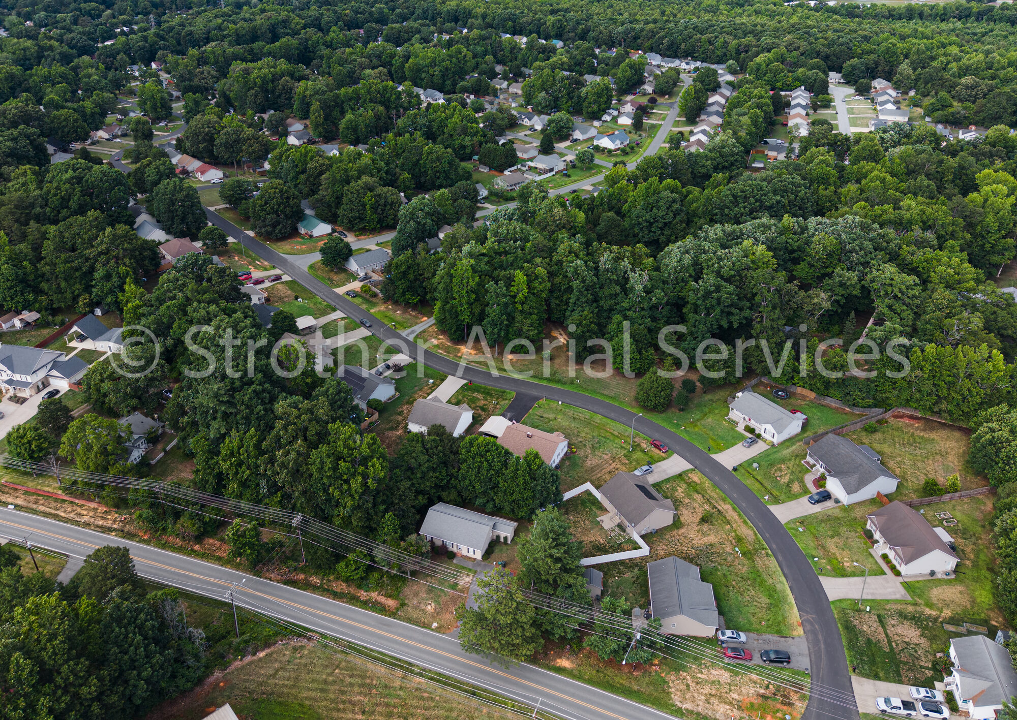 Wide aerial overview of a Piedmont Triad subdivision